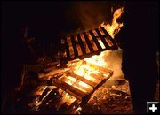 Building the Fire Higher. Photo by Terry Allen.