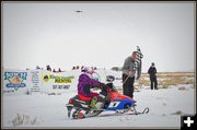 Koral Gets the Checkered Flag. Photo by Terry Allen.