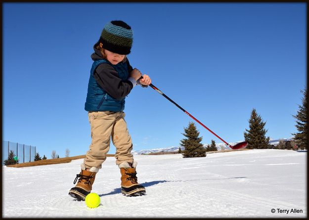 Jackson Takes a Practice Swing. Photo by Terry Allen.