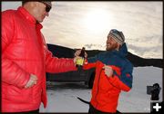 Martin gives Gabe a cold one.. Photo by Terry Allen.