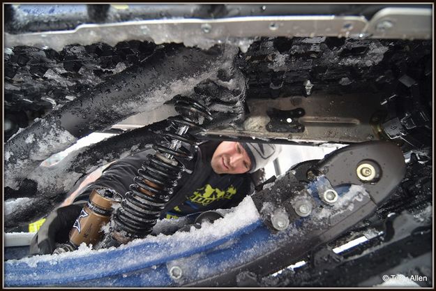 Cole Knocking Off Ice. Photo by Terry Allen.