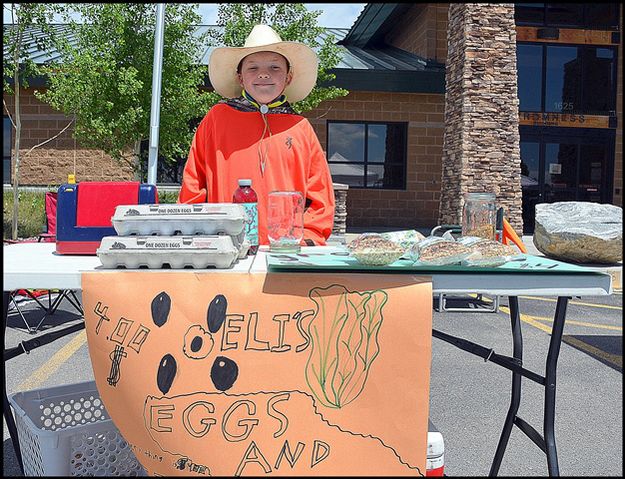 Eli Knows Eggs and Chickens and People. Photo by Terry Allen.