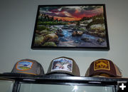 Hats and art. Photo by Pinedale Online.