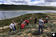 Installing fence. Photo by Wyoming Game & Fish.