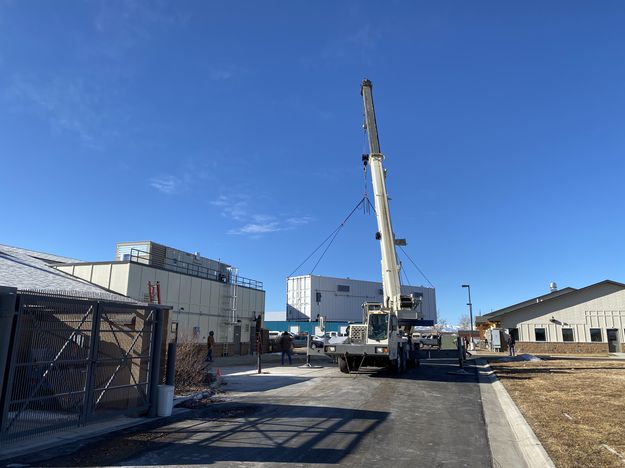 Placing container units. Photo by Sublette County Rural Health Care District.