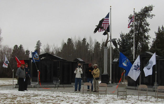 Cutting the red ribbon. Photo by Dawn Ballou, Pinedale Online.