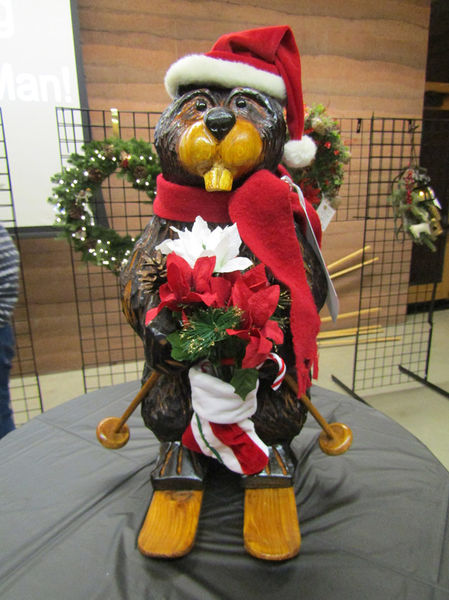 Santa Beaver on Skis Chainsaw Carving. Photo by Pinedale Online.