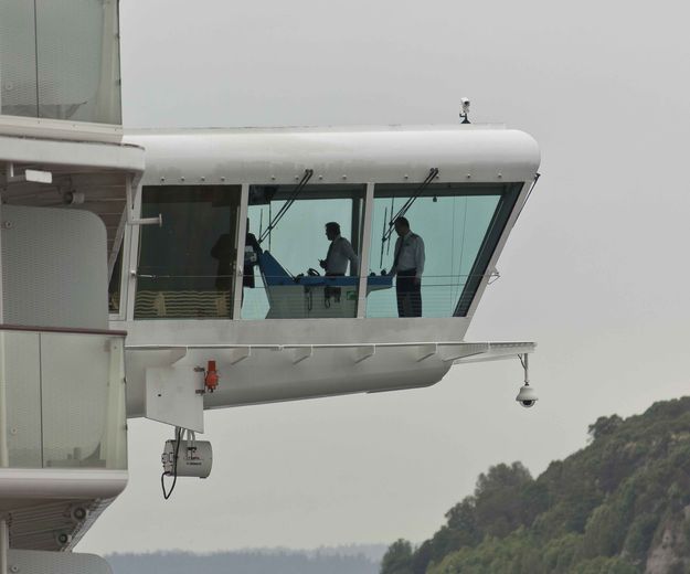 Captain (far right) On Starboard Bridge Wing. Photo by Dave Bell.