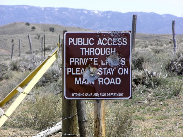 Shot up sign. Photo by Alan Svalberg, Jason Brown.