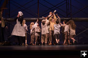 Oliver and the orphans. Photo by Arnold Brokling.